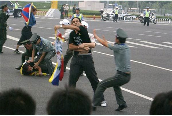 Students for a Free Tibet released this photo showing activists being detained by Chinese authorities during a "symbolic protest" outside the stadium earlier in the day.